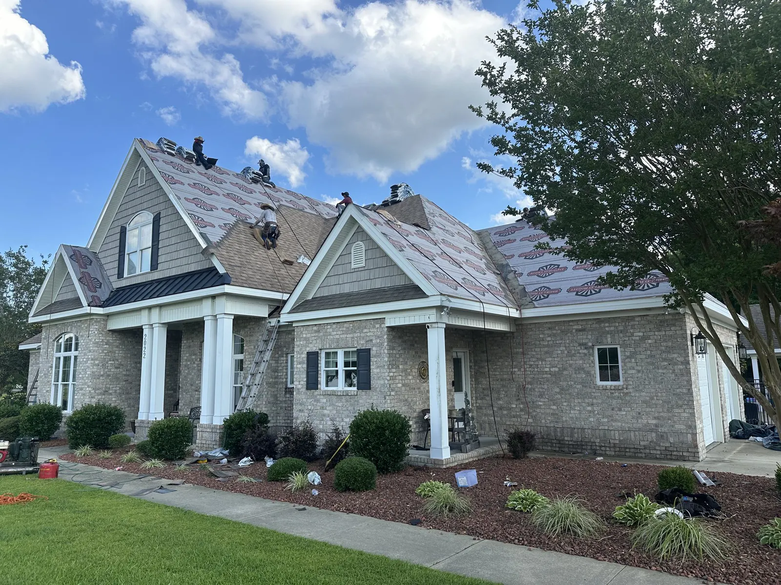 Crew at work — underlayment and shingle install, Eastern NC — Carolina Trophy Roofs, Windsor, North Carolina